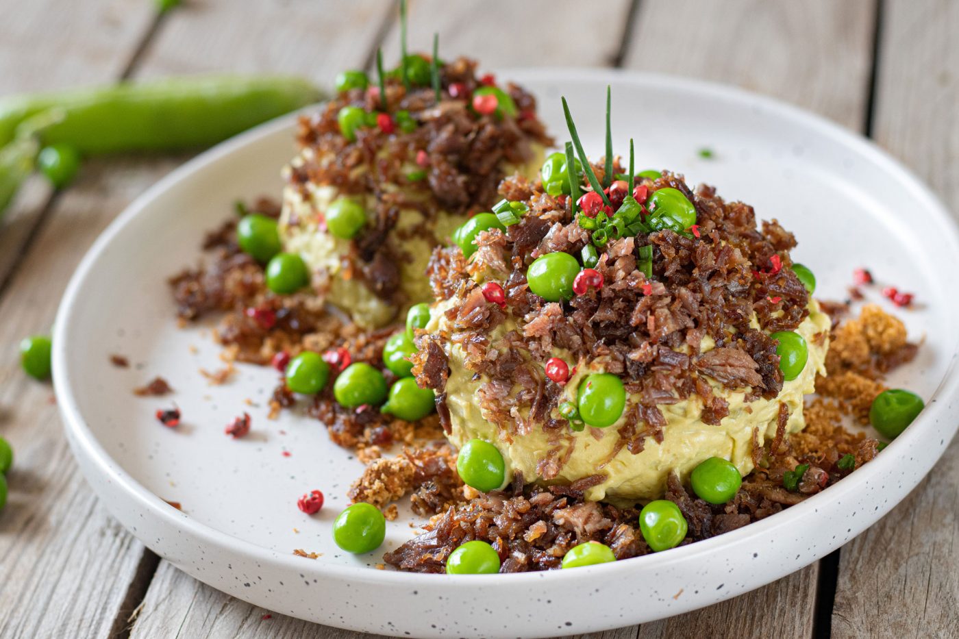 Recette confit de canard fermier des Landes, champignons frais et purée de petits pois.